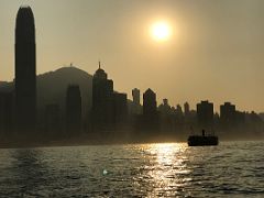07B Sun blazing over International Finance Centre IFC stretching to Sai Ying Pun district from Star Ferry late afternoon Hong Kong